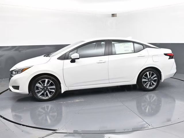 2025 Aspen White Tricoat Nissan Versa 1.6 SV FWD Sedan