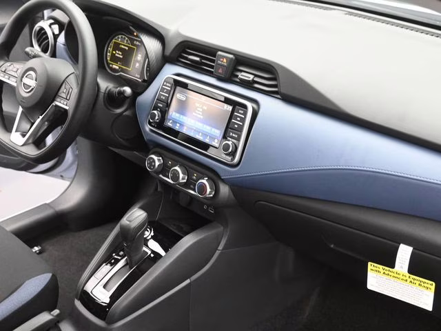 2025 Gray Sky Pearl Nissan Versa 1.6 SV FWD Sedan