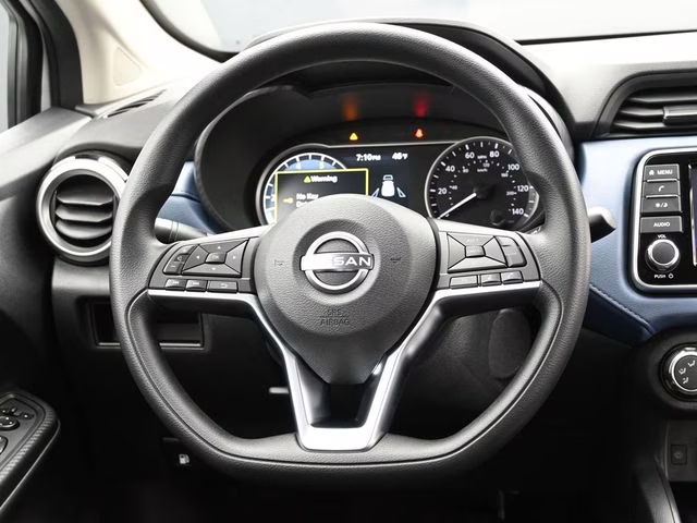 2025 Aspen White Tricoat Nissan Versa 1.6 SV FWD Sedan