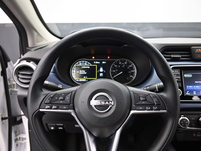 2025 Aspen White Tricoat Nissan Versa 1.6 SV FWD Sedan