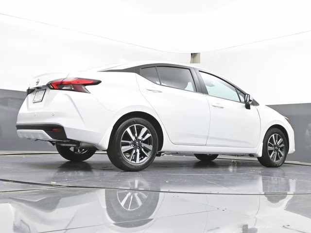 2025 Aspen White Tricoat Nissan Versa 1.6 SV FWD Sedan