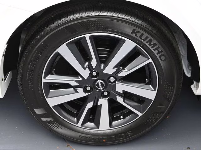 2025 Aspen White Tricoat Nissan Versa 1.6 SV FWD Sedan