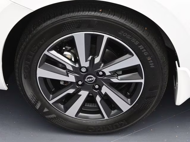 2025 Aspen White Tricoat Nissan Versa 1.6 SV FWD Sedan