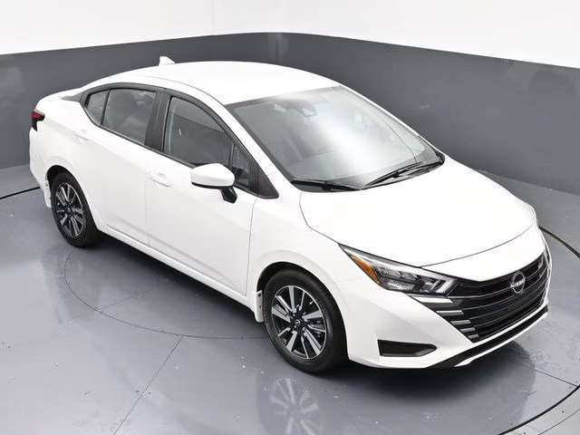 2025 Aspen White Tricoat Nissan Versa 1.6 SV FWD Sedan