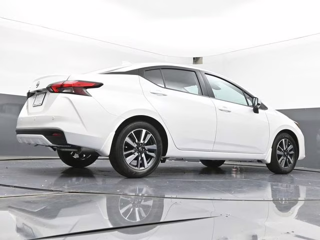 2025 Aspen White Tricoat Nissan Versa 1.6 SV FWD Sedan