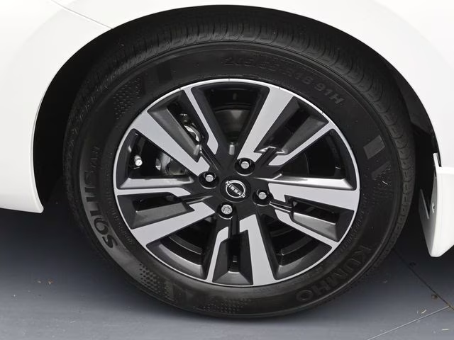 2025 Aspen White Tricoat Nissan Versa 1.6 SV FWD Sedan