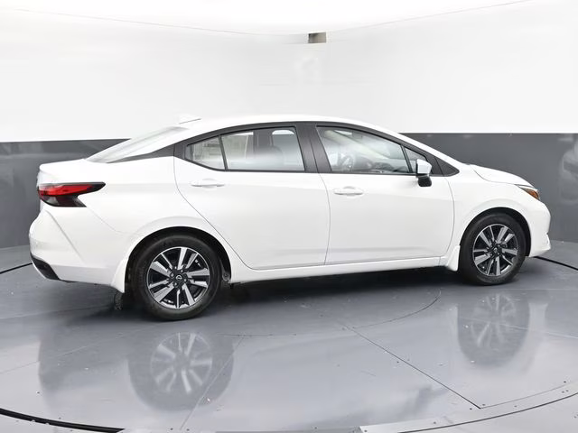 2025 Aspen White Tricoat Nissan Versa 1.6 SV FWD Sedan