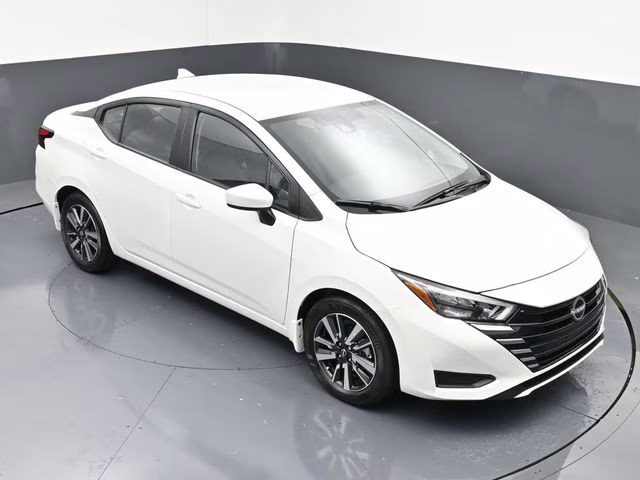 2025 Aspen White Tricoat Nissan Versa 1.6 SV FWD Sedan