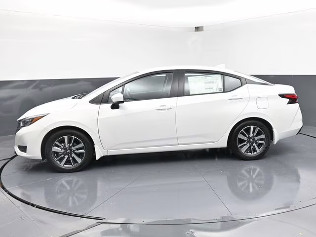2025 Aspen White Tricoat Nissan Versa 1.6 SV FWD Sedan