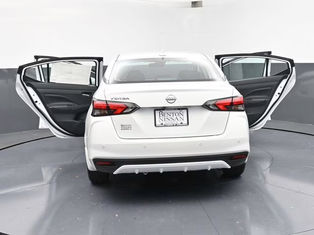2025 Aspen White Tricoat Nissan Versa 1.6 SV FWD Sedan