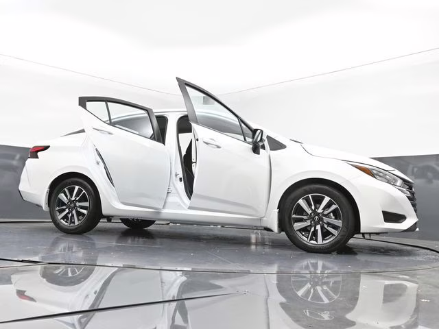 2025 Aspen White Tricoat Nissan Versa 1.6 SV FWD Sedan