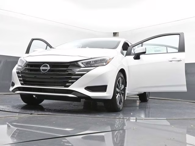 2025 Aspen White Tricoat Nissan Versa 1.6 SV FWD Sedan