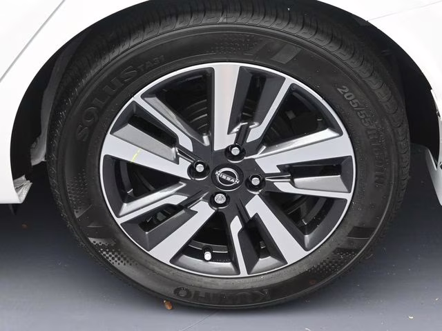 2025 Aspen White Tricoat Nissan Versa 1.6 SV FWD Sedan