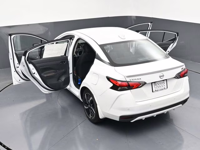 2025 Aspen White Tricoat Nissan Versa 1.6 SR FWD Sedan
