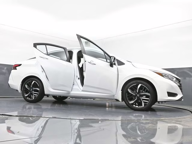 2025 Aspen White Tricoat Nissan Versa 1.6 SR FWD Sedan