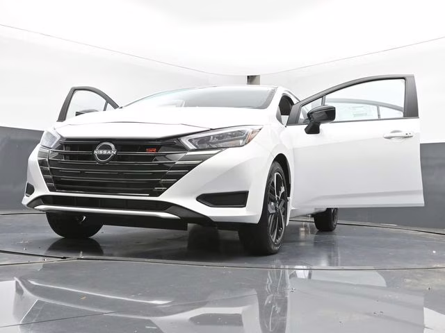 2025 Aspen White Tricoat Nissan Versa 1.6 SR FWD Sedan