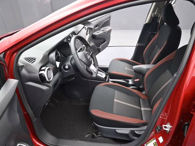 2025 Scarlet Ember Tintcoat Nissan Versa 1.6 SR FWD Sedan