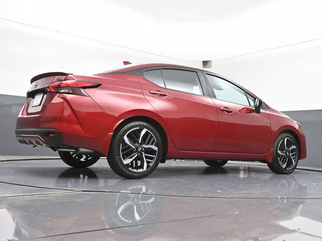 2025 Scarlet Ember Tintcoat Nissan Versa 1.6 SR FWD Sedan