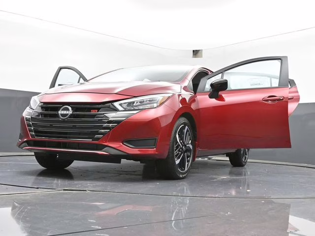 2025 Scarlet Ember Tintcoat Nissan Versa 1.6 SR FWD Sedan