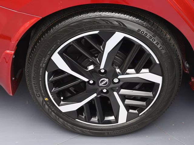 2025 Scarlet Ember Tintcoat Nissan Versa 1.6 SR FWD Sedan