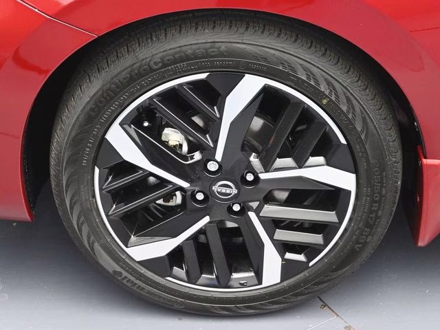 2025 Scarlet Ember Tintcoat Nissan Versa 1.6 SR FWD Sedan