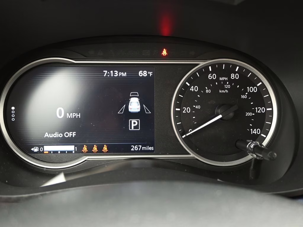 2025 Scarlet Ember Tintcoat Nissan Versa 1.6 SV FWD Sedan