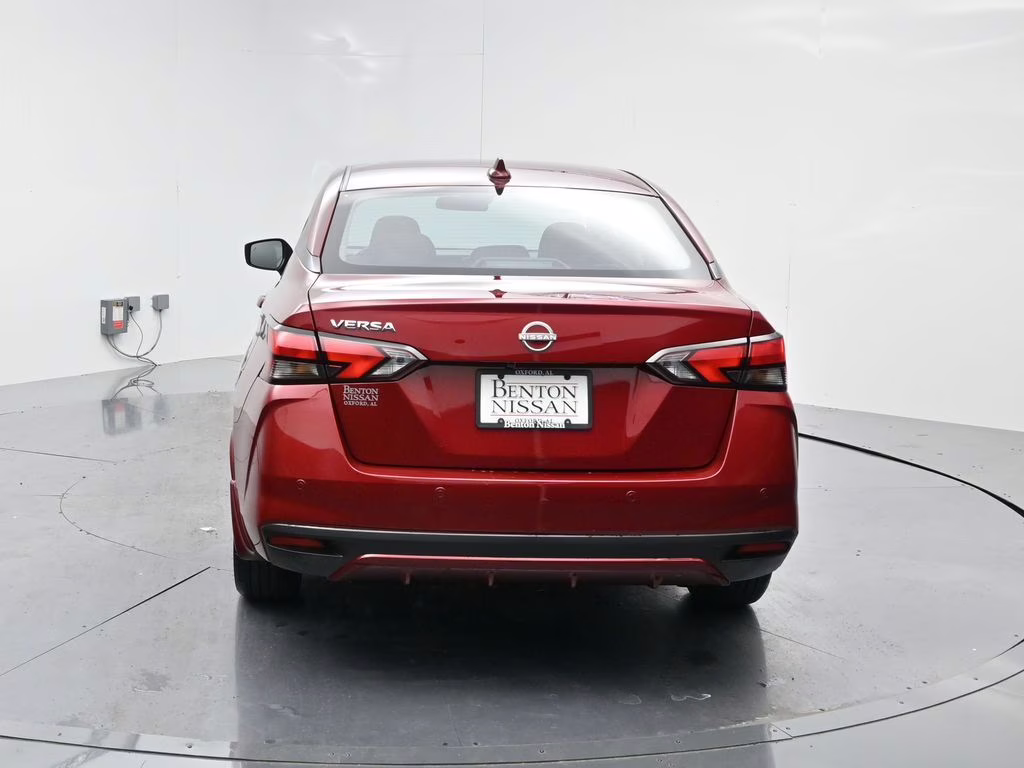 2025 Scarlet Ember Tintcoat Nissan Versa 1.6 SV FWD Sedan