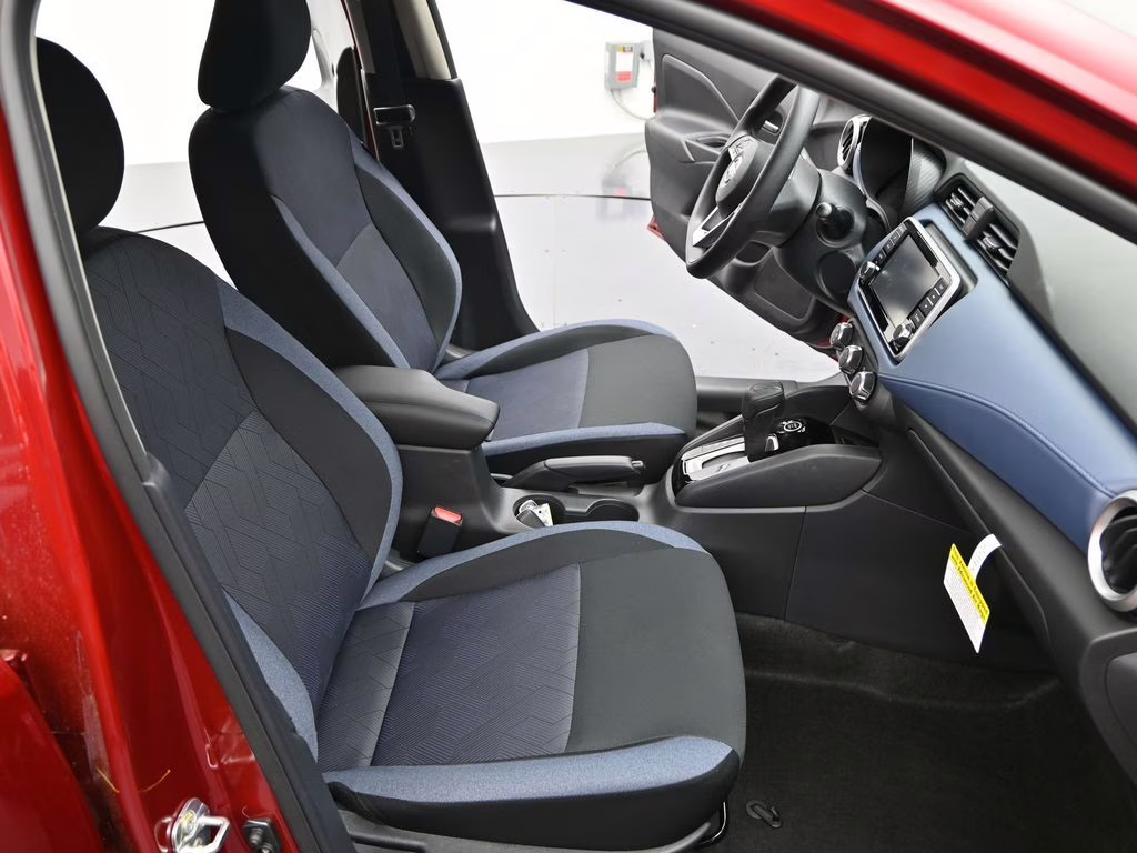 2025 Scarlet Ember Tintcoat Nissan Versa 1.6 SV FWD Sedan