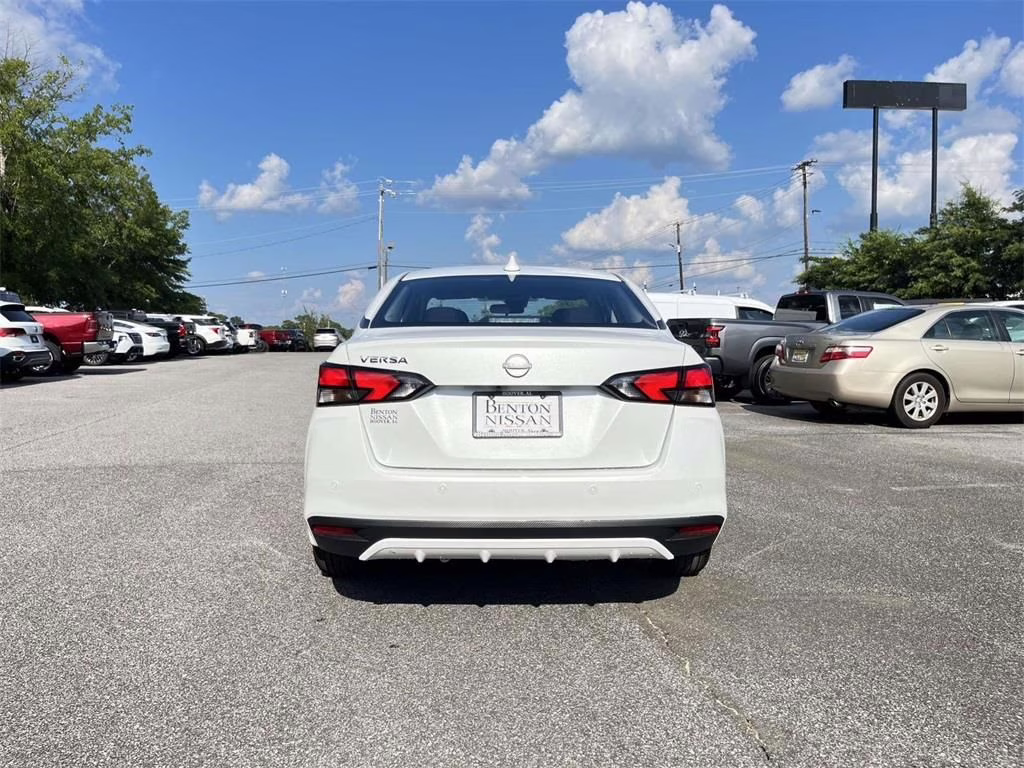 2025 Aspen White Tricoat Nissan Versa 1.6 SV FWD Sedan