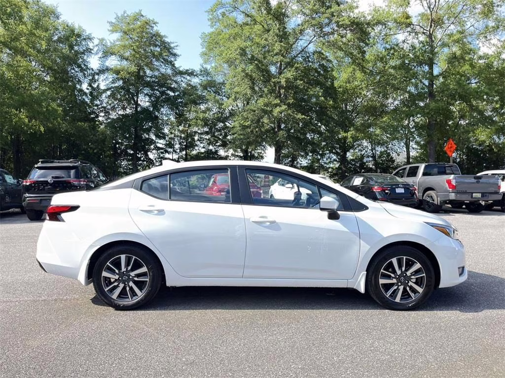 2025 Aspen White Tricoat Nissan Versa 1.6 SV FWD Sedan