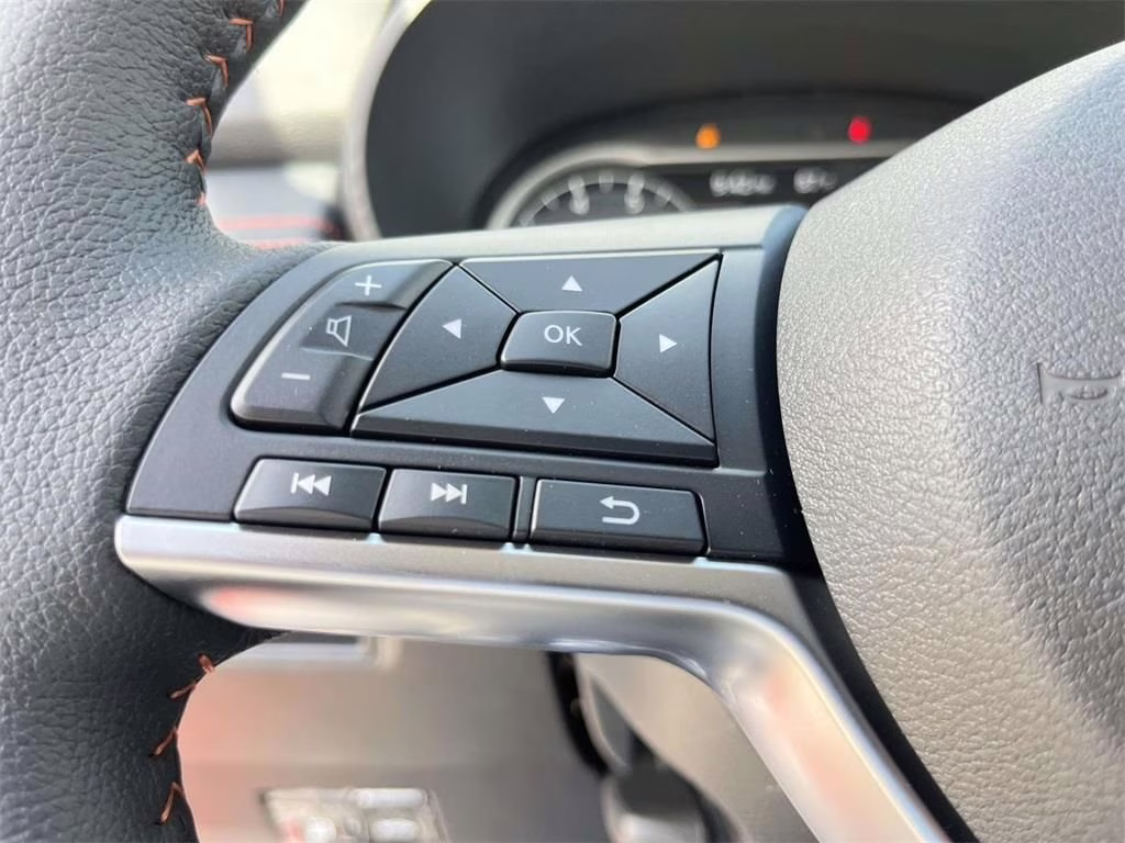 2025 Scarlet Ember Tintcoat Nissan Versa 1.6 SR FWD Sedan