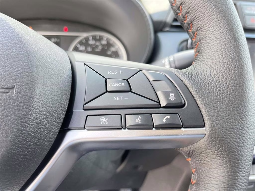 2025 Scarlet Ember Tintcoat Nissan Versa 1.6 SR FWD Sedan