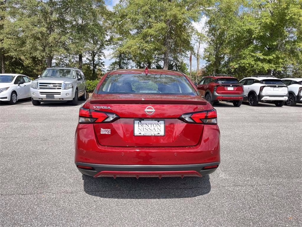 2025 Scarlet Ember Tintcoat Nissan Versa 1.6 SR FWD Sedan