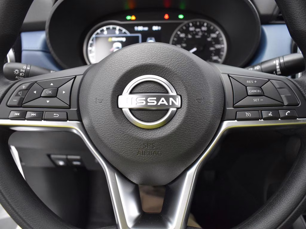 2025 Aspen White Tricoat Nissan Versa 1.6 SV FWD Sedan