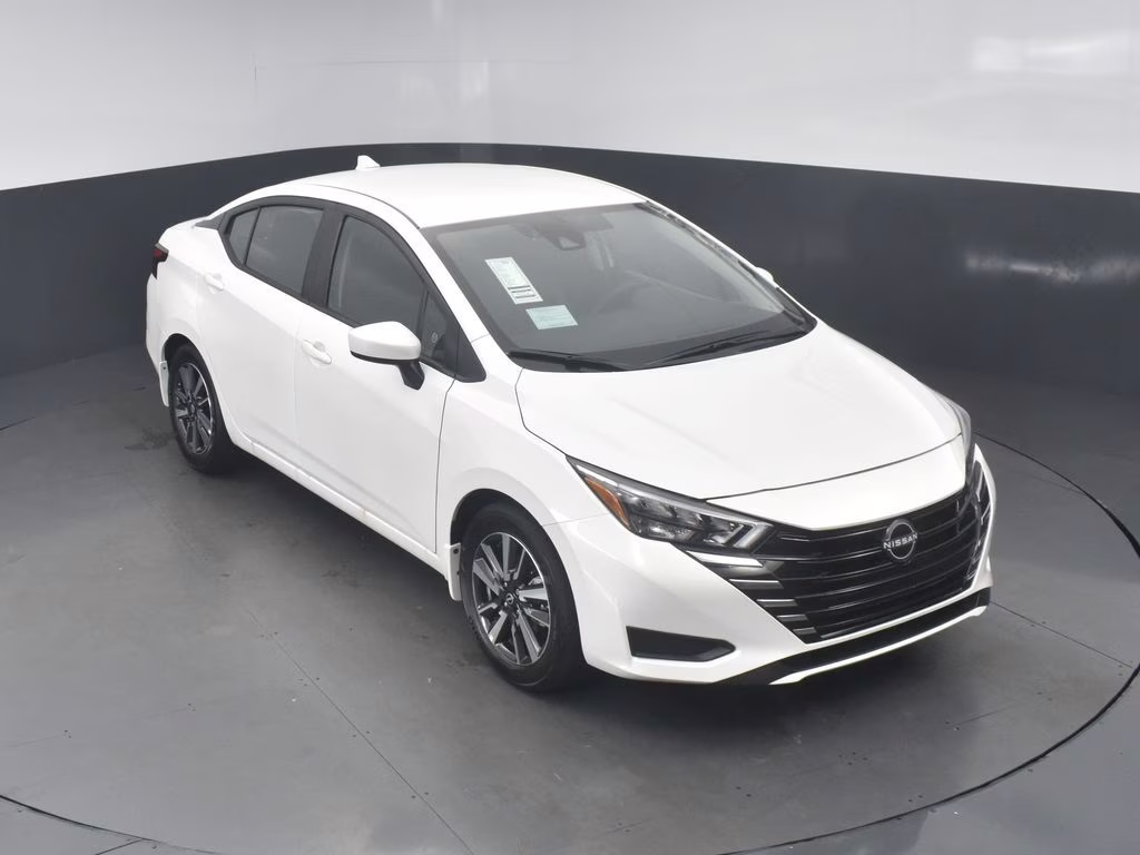 2025 Aspen White Tricoat Nissan Versa 1.6 SV FWD Sedan