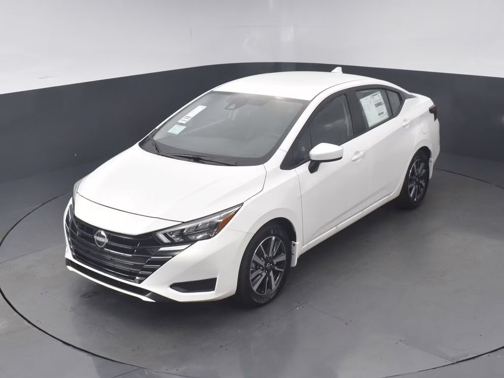 2025 Aspen White Tricoat Nissan Versa 1.6 SV FWD Sedan