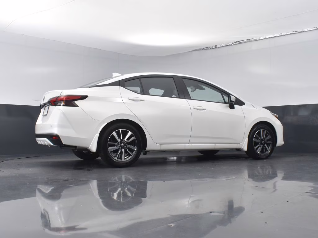 2025 Aspen White Tricoat Nissan Versa 1.6 SV FWD Sedan