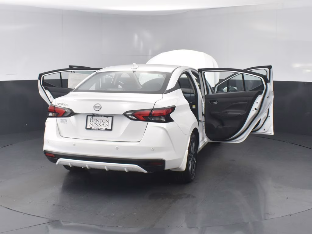 2025 Aspen White Tricoat Nissan Versa 1.6 SV FWD Sedan