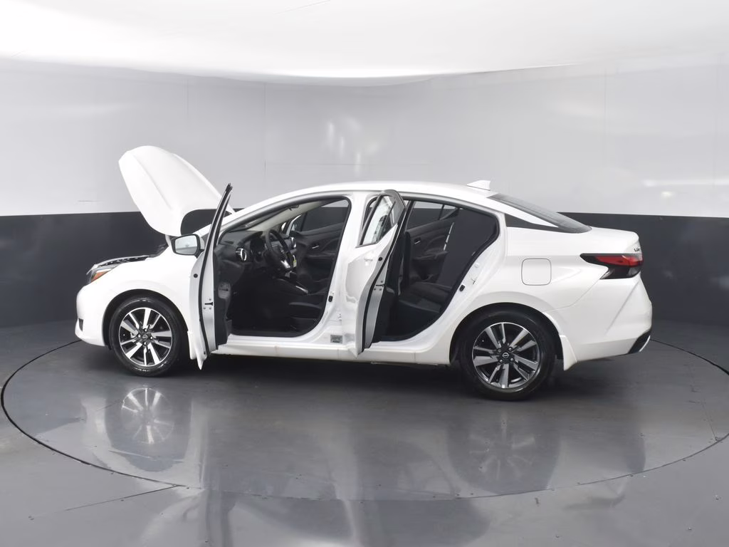 2025 Aspen White Tricoat Nissan Versa 1.6 SV FWD Sedan