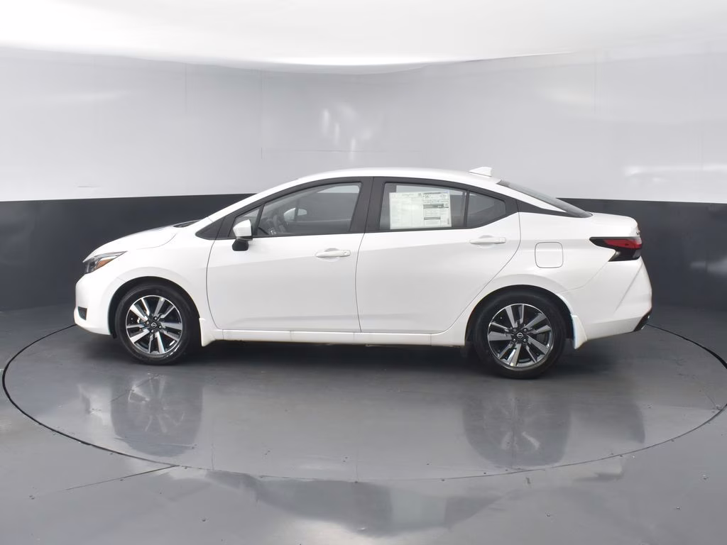 2025 Aspen White Tricoat Nissan Versa 1.6 SV FWD Sedan