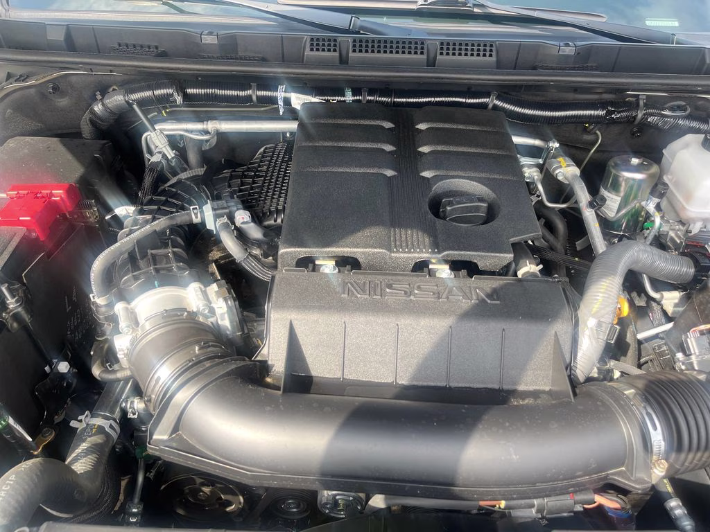 2026 Glacier White Nissan Frontier SV RWD Truck