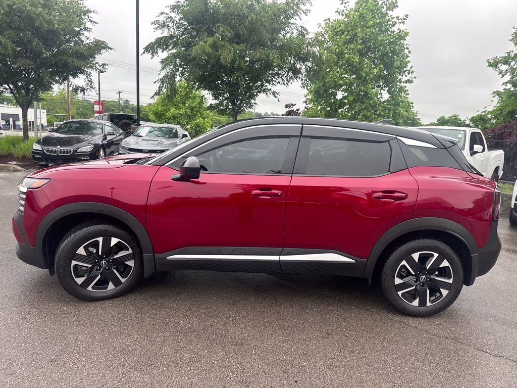 2025 Scarlet Ember Tintcoat/Super Black Nissan Kicks SV AWD SUV
