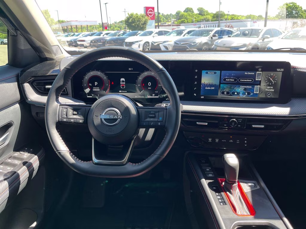 2025 Deep Blue Pearl/Gun Metallic Nissan Kicks SR FWD SUV