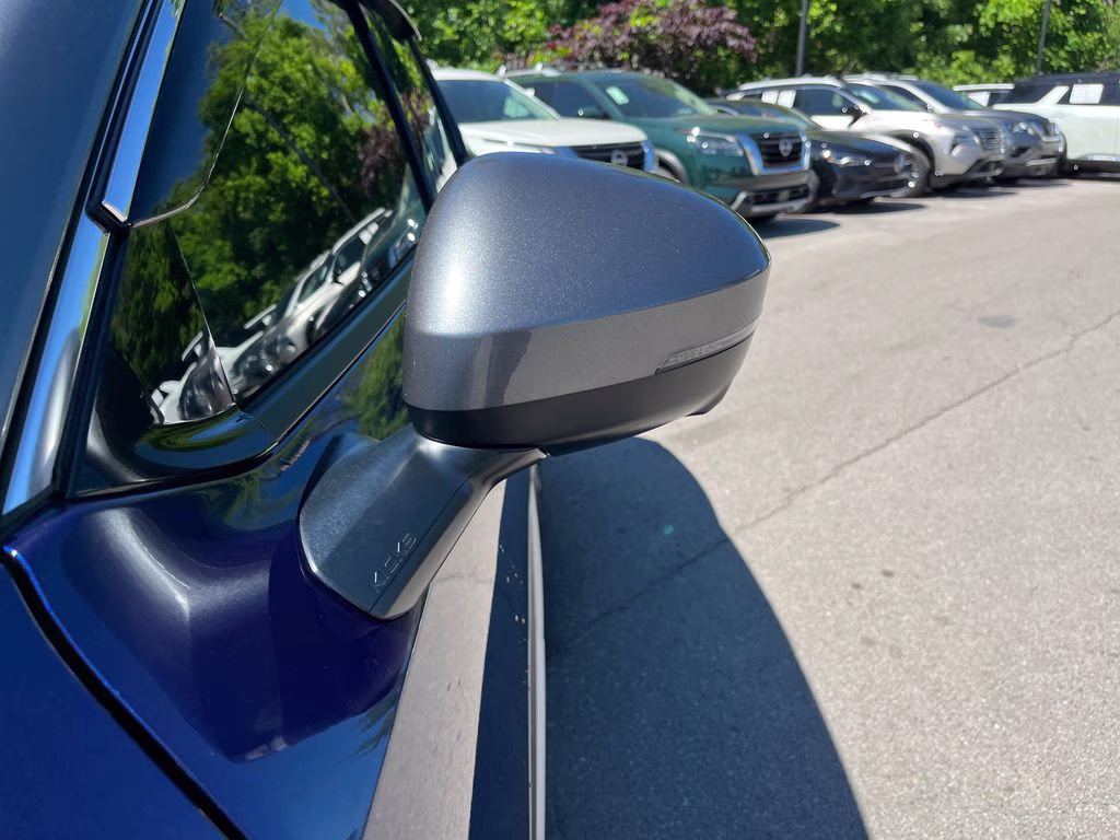 2025 Deep Blue Pearl/Gun Metallic Nissan Kicks SR FWD SUV