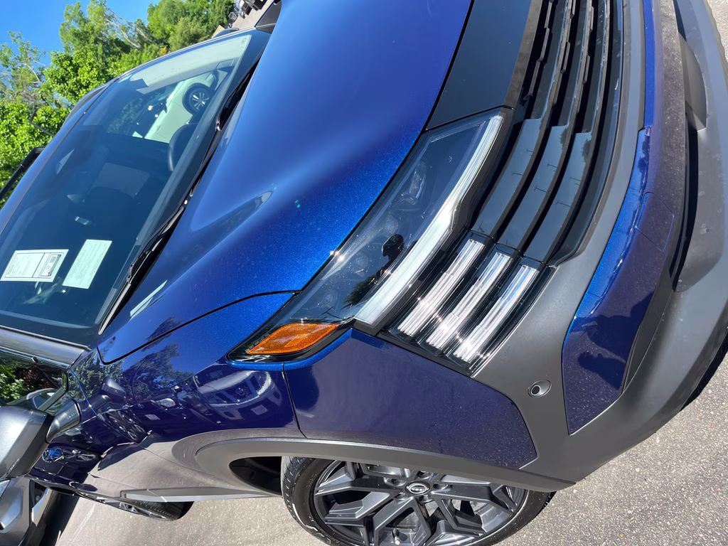 2025 Deep Blue Pearl/Gun Metallic Nissan Kicks SR FWD SUV