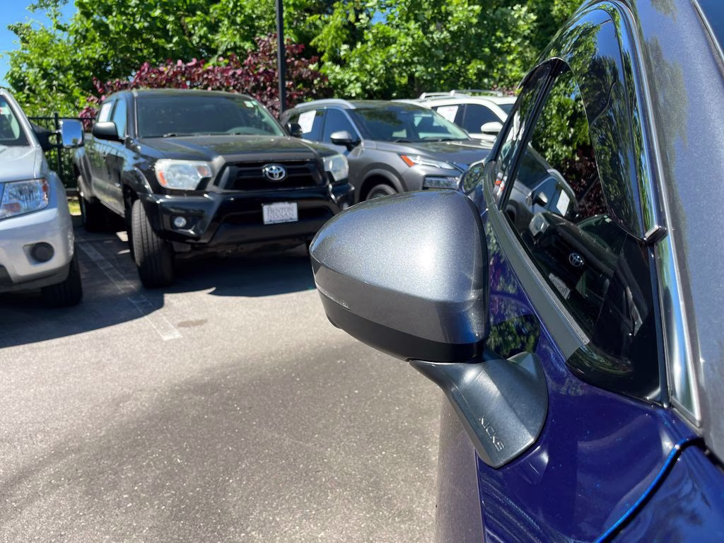 2025 Deep Blue Pearl/Gun Metallic Nissan Kicks SR FWD SUV