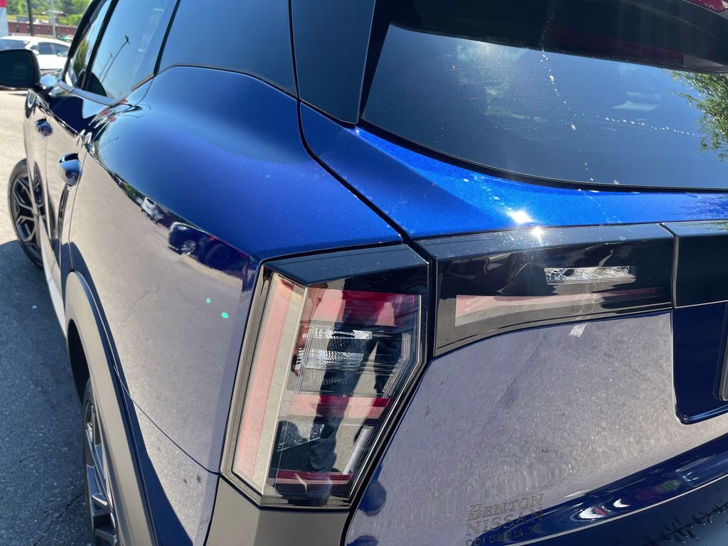 2025 Deep Blue Pearl/Gun Metallic Nissan Kicks SR FWD SUV