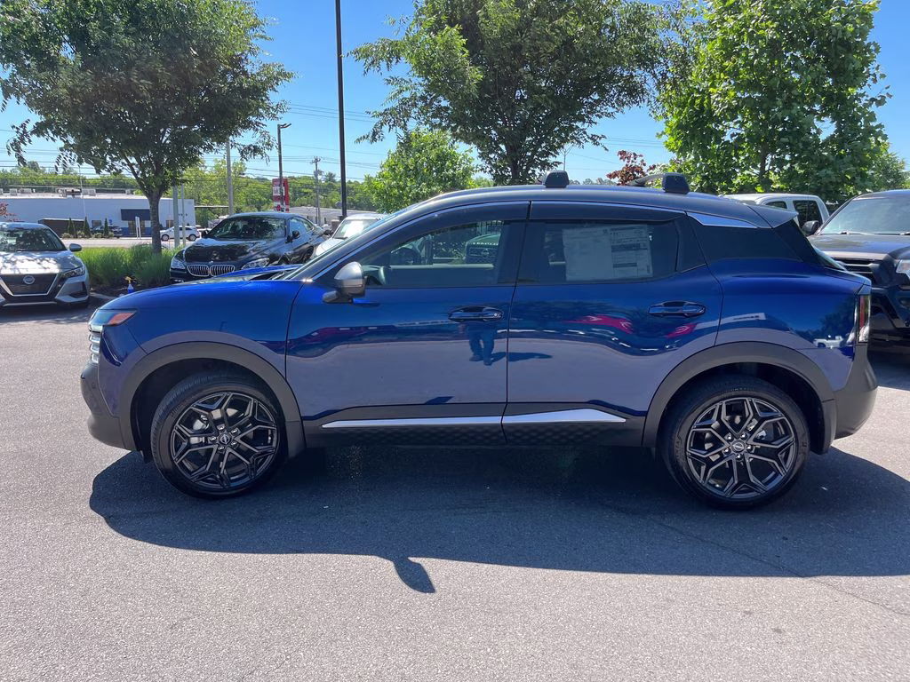 2025 Deep Blue Pearl/Gun Metallic Nissan Kicks SR FWD SUV