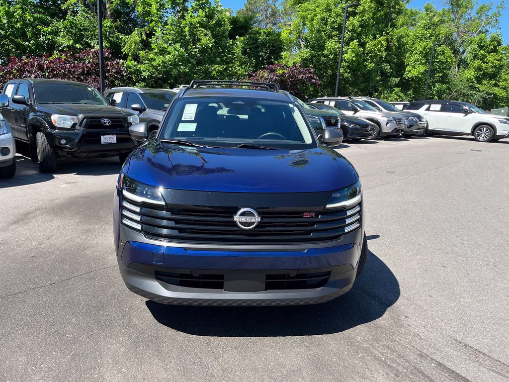 2025 Deep Blue Pearl/Gun Metallic Nissan Kicks SR FWD SUV
