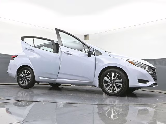 2025 Gray Sky Pearl Nissan Versa 1.6 SV FWD Sedan